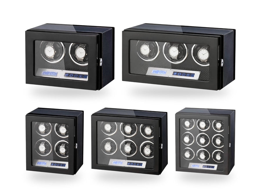 The touchscreen winders side by side on a white background, plain unbranded watches on the cushions.
